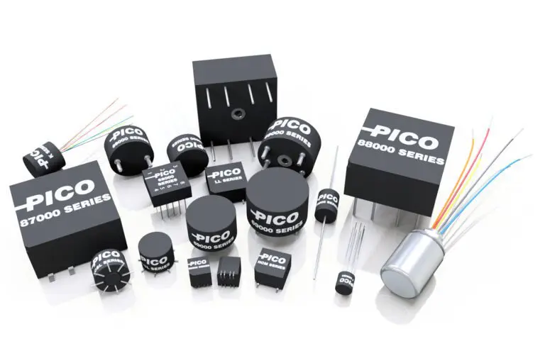 Assorted electronic components labeled "PICO," including capacitors, inductors, and resistors, arranged on a white surface.