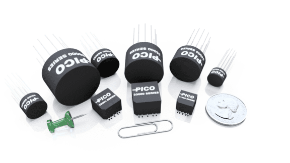 A collection of various-sized electronic components labeled "Pico 30000 Series" displayed with a coin, a green pushpin, and a paperclip for size comparison.