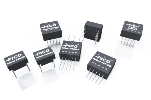 Seven black rectangular electronic components labeled "PICO 69000 SERIES" are arranged on a white surface, each with four visible metal pins.