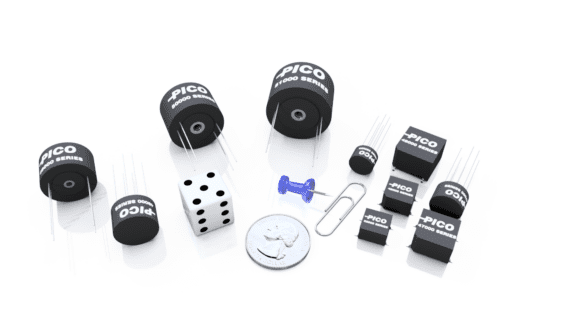 A collection of small electronic components, a white die, a blue pushpin, a metal paperclip, and a coin displayed on a white surface.