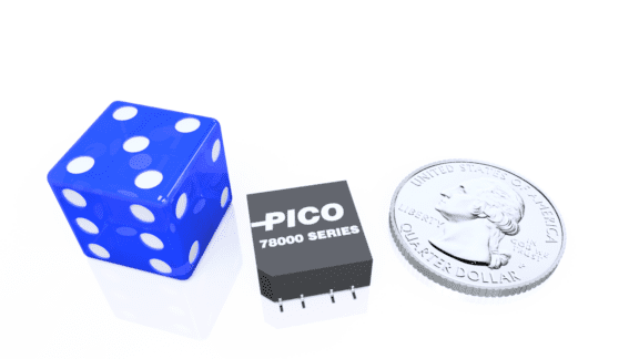 A blue six-sided die, a small electronic component labeled "PICO 78000 SERIES," and a U.S. quarter stand side by side on a reflective surface.