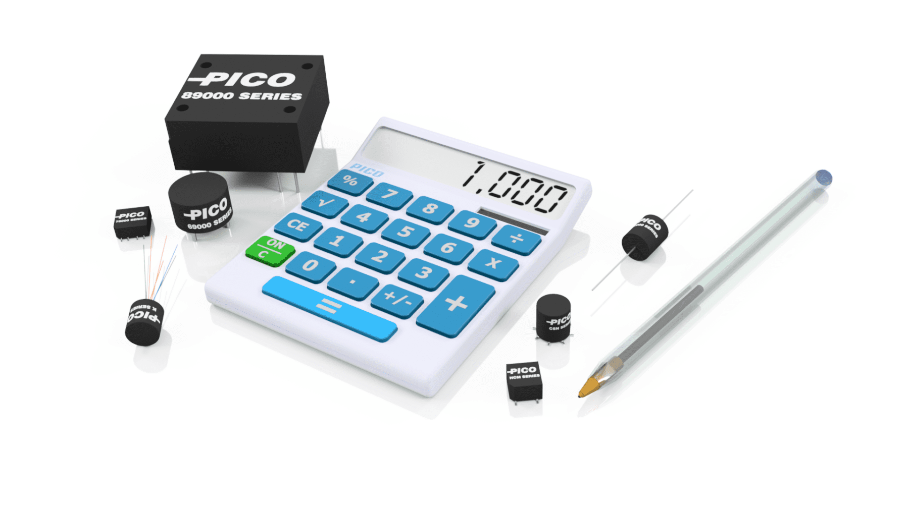 Pico transformers and inductors with calculator and a ballpoint pen.